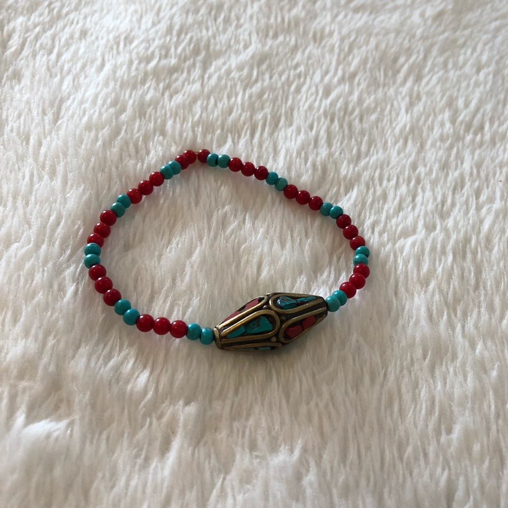 Brass wintag braclate with turquoise